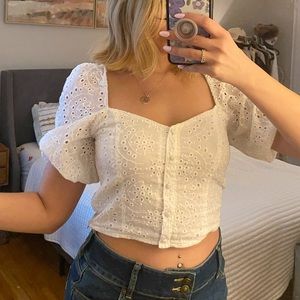 Eyelet top with puff sleeves